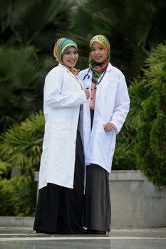 Two Women Doctor With Scarf, Outdoor