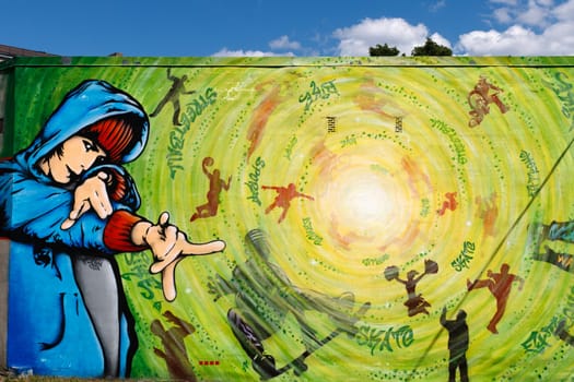Detail of graffiti painted illegally on public wall in Latvia