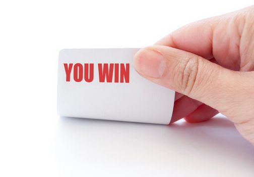 Hand holding a playing card labelled 'you win'