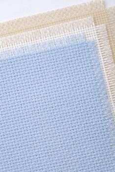 Needlework, materials and accessories for embroidery a cross