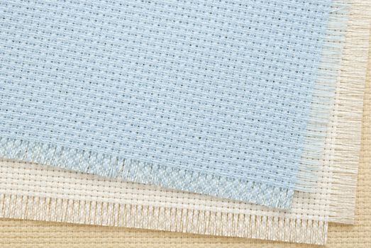 Needlework, materials and accessories for embroidery a cross