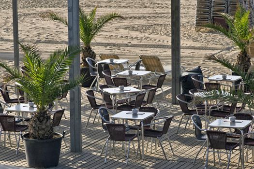 Cafe on the morning beach, Barcelona, Catalonia.