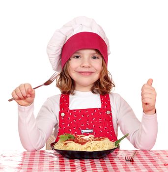 happy little girl cook with spaghetti