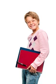 Portrait of young smiling student holding notebooks isolated on white background