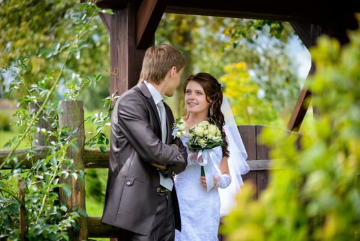 Bride and groom outdoor portrait