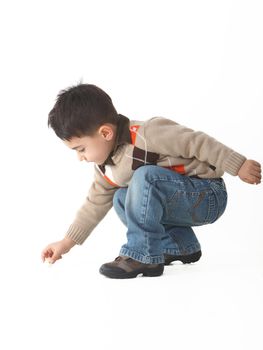 Adorable child in studio isolated on white background