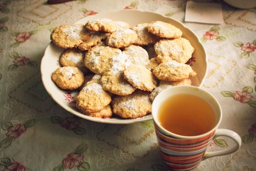 Group of homemade oats cookies closeup on a dish