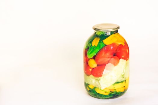 pickled cucumber and tomato in glass