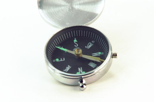 compass exploring navigation equipment in white background