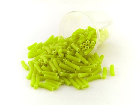 Green Pasta Macaroni on White Background