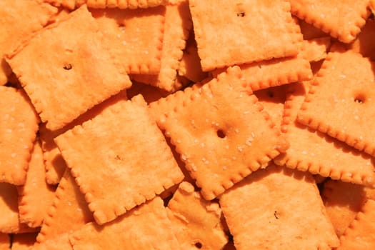 Close up of orange cheese crackers.
