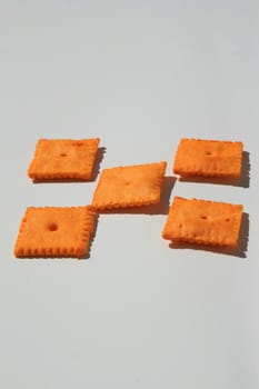 Close up of orange cheese crackers.
