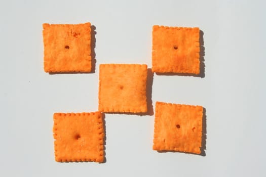 Close up of orange cheese crackers.
