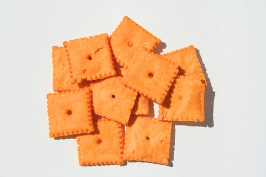 Close up of orange cheese crackers.
