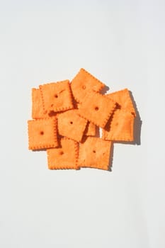 Close up of orange cheese crackers.
