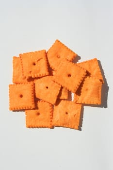 Close up of orange cheese crackers.
