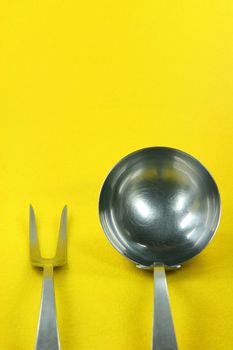 food and restaurants concepts cooking tools in yellow background