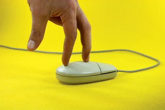 surfing on mouse in yellow background