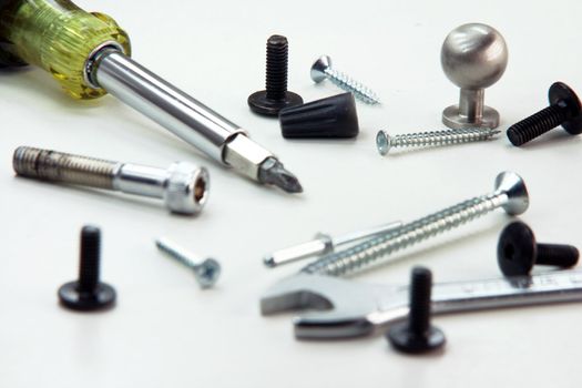 tools screw screwdriver and hardware staff in white background