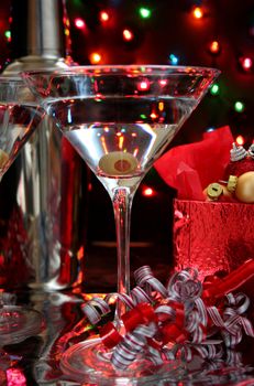 Martini with an olive in a low light image. Perfect for Christmas or New Years ad.