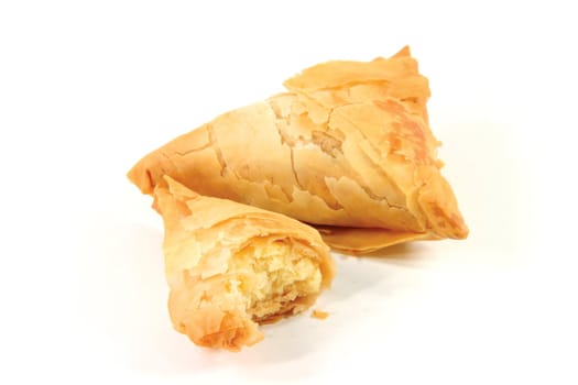 little cheese pies isolated in white from greek traditional cuisine