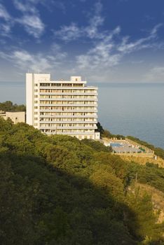 Modern hotel on coast of ocean in a picturesque place