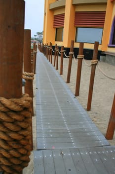 Close up of a decorative pathway on a beach.
