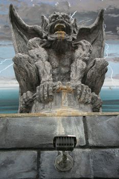 Close up of a unique gargoyle statue.
