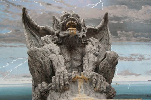 Close up of a unique gargoyle statue.
