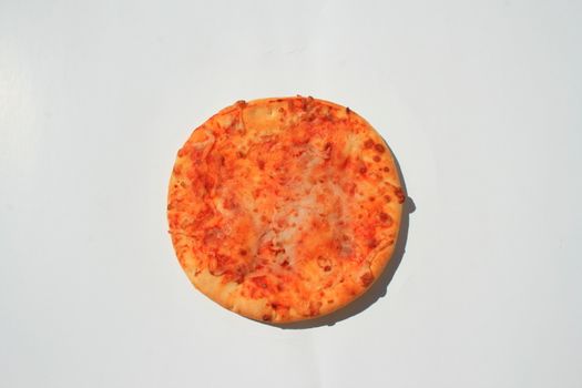 Close up of a mini cheese pizza.
