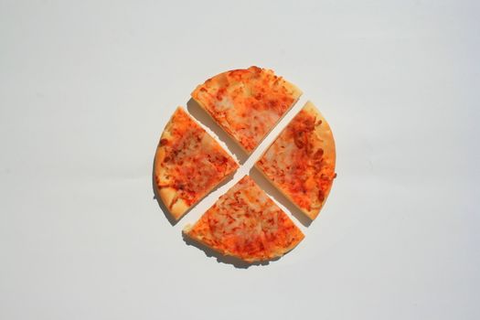 Close up of a mini cheese pizza slices.
