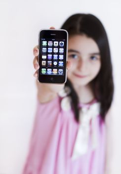 Galati, Romania - April 10, 2011: Apple IPhone 3s, the third generation smart phone displaying the home screen with applications