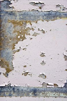 Old crumbling wall paint backdrop. Ancient architecture details.