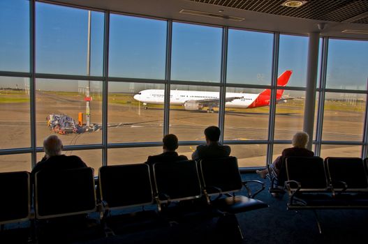 passangers and airplane in Adelaide Airport, australia