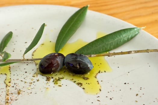 Black Olives and oil on dish