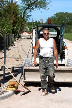 Construction worker working on new  street