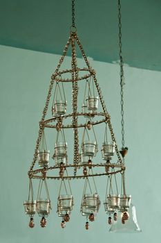 Candles Chandelier in vintage retro style hanged in a mansion house