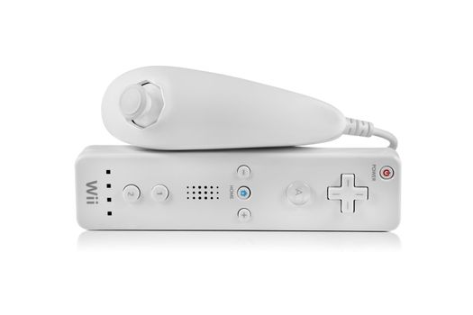 A studio shot of a Nintendo Wii nunchuk and controller set shot on a solid white background.