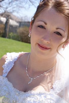 A Closeup shot of a woman in her bridal dress.