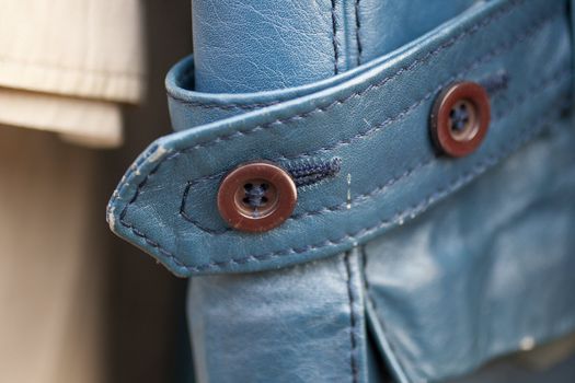 Photo of leather cuff with buttons