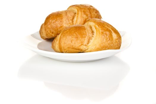 French croissants over white background