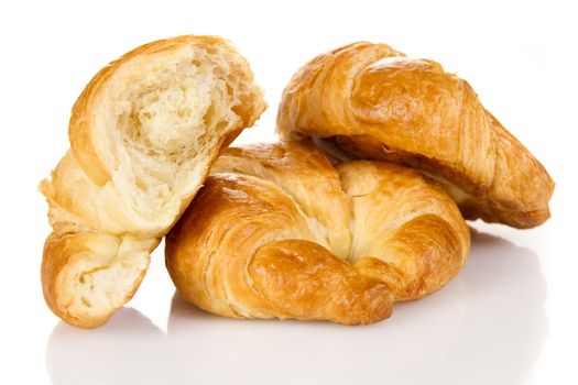 French croissants over white background