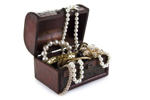 Treasure Chest full of jewelery  isolated over white background