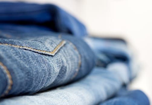 Jeans stacked on a shop