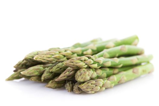 Fresh asparagus isolated over white