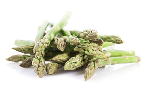 Fresh asparagus isolated over white