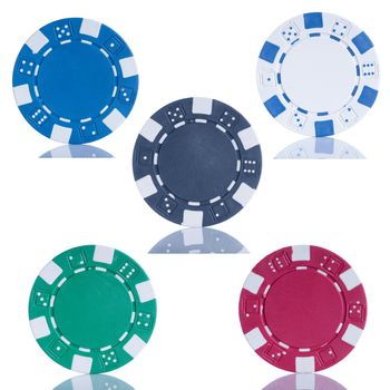 Five poker chips isolated on white background