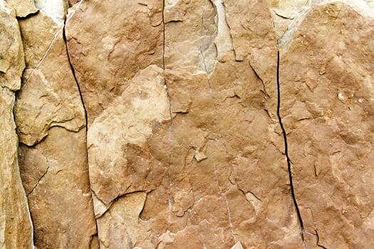 stone rock with cracks in the background