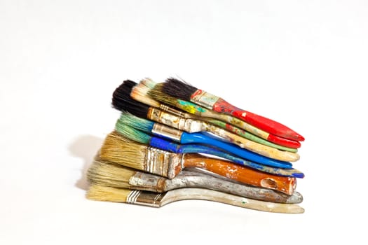 Paintbrushes on white background