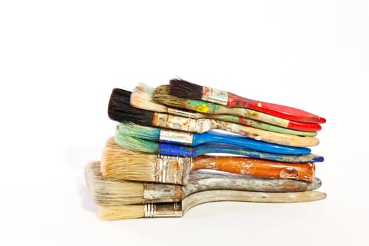 Paintbrushes on white background